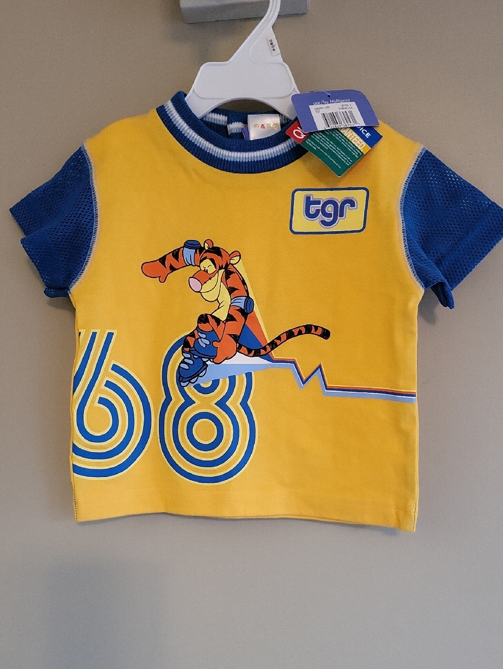 NWT Disney Tigger bright yellow and blue tee shirt